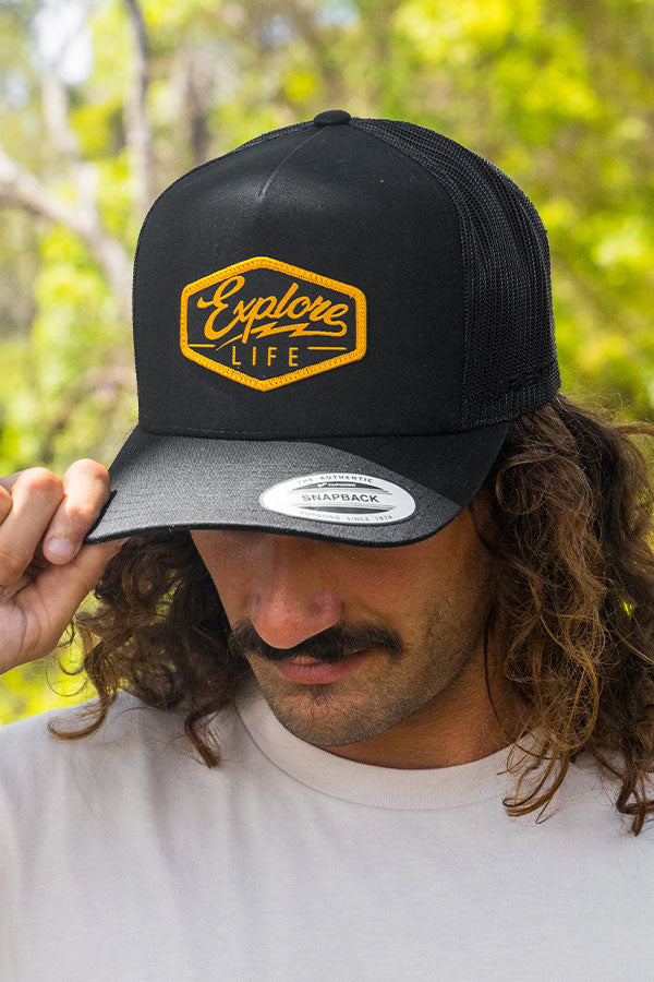 Explore Script Patch Trucker Hat - Black/Orange