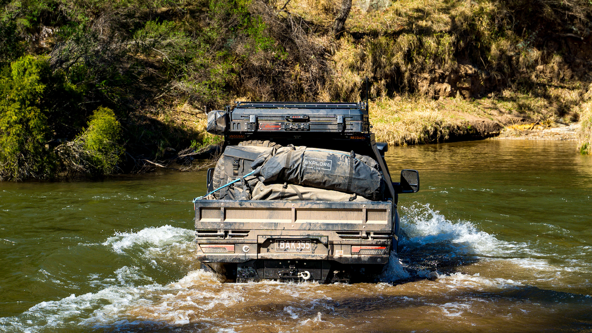 Driving through creek with Explore gear in tray